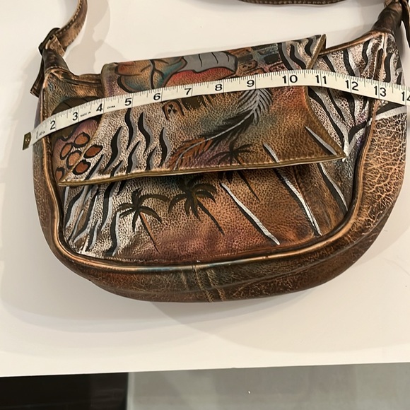 Sova Hand-painted Leather Crossbody. Never  used. Earth tone with silver accent - Picture 7 of 15